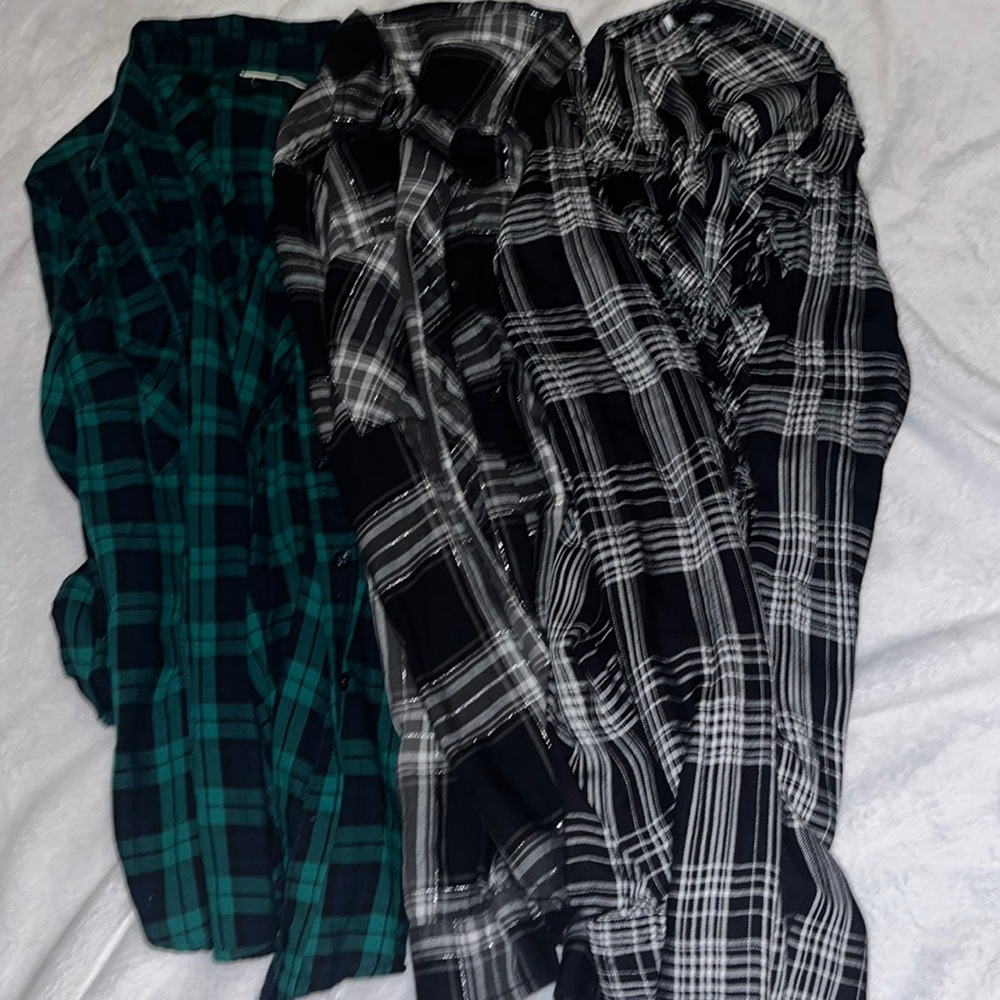 3 Size Large flannels, Worn twice, 2 Black, 1 green